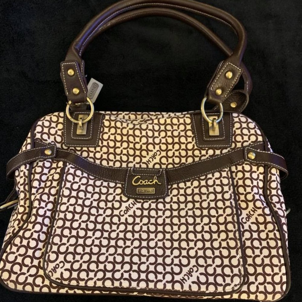 Used ivory handbag with brown logo print